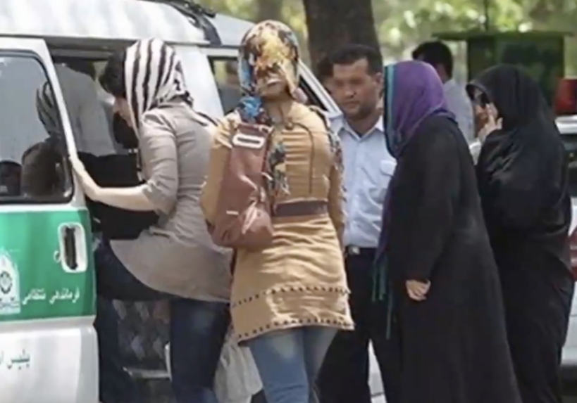 Iranian women being ushered into a van by "Morality police" (Image: X)